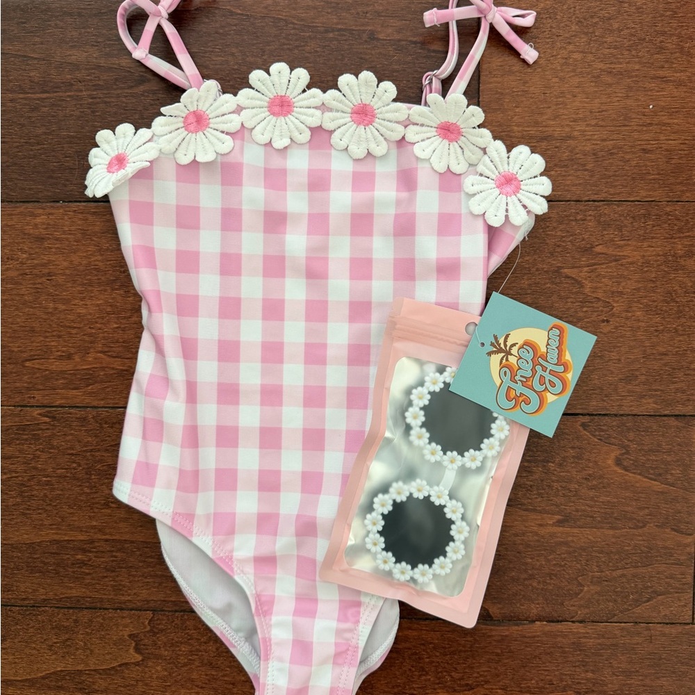 Kids Pink Gingham One-Piece Swimsuit with Daisy Trim and matching glasses